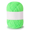 A ball of bright lime green soft milk cotton knitting yarn.
