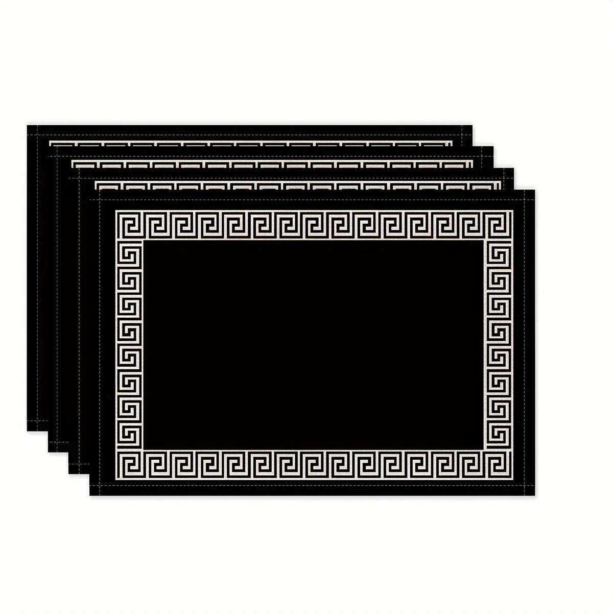 A stack of black solid linen blend table placemats with ornate gold-colored Greek key borders.