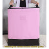 A pink heavy duty waterproof storage bag with a black base and widened handles is shown.
