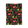 A black fabric throw blanket featuring repeating designs of mice and the phrase Mighty of Mice.