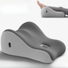 A gray memory foam wedge pillow for couples shown in a side profile.