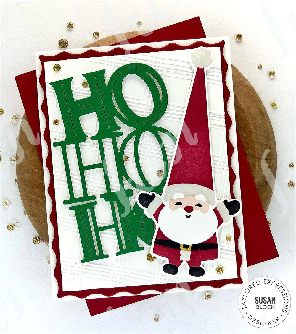 A set of quilt squares layering stencil and metal cutting dies in green and red on white paper.