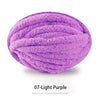 A ball of purple, extra thick hand-knitted yarn labeled 07-Light Purple.