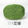 A ball of olive green organic cotton 4ply knitting yarn.