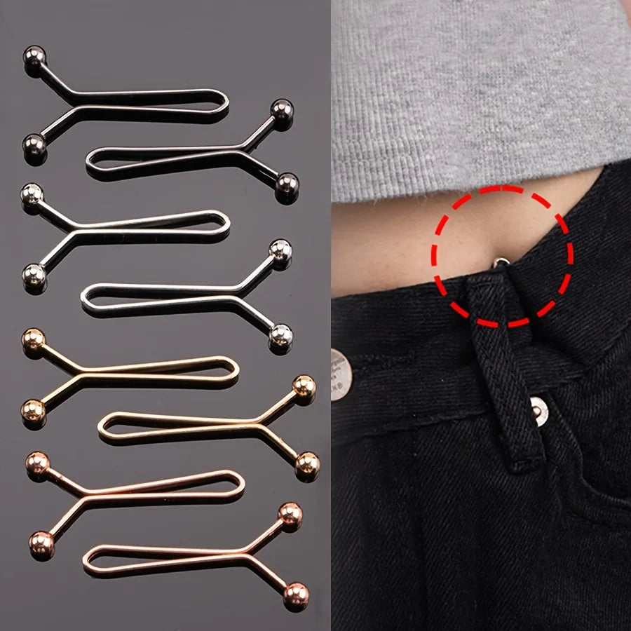 A set of ten invisible metal lapel clips in various finishes, shown against a dark background.