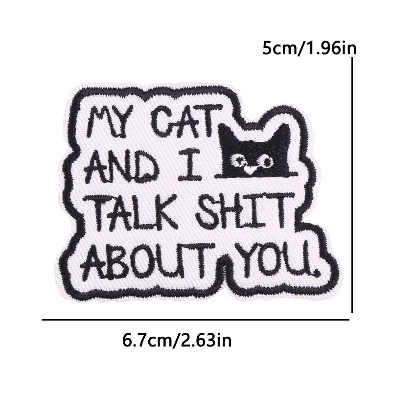 Black embroidery patch with white text that reads My Cat And I Talk Shit About You