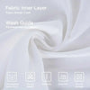 A white fabric inner layer with washing instructions displayed on a background of draped white fabric.