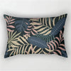 A decorative pillowcase featuring a tropical leaf print design in shades of dark blue, pink, and olive green.
