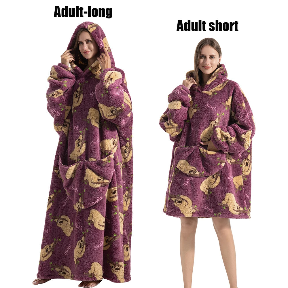 A purple adult long fleece blanket hoodie with gold embroidered elephants shown on a model.