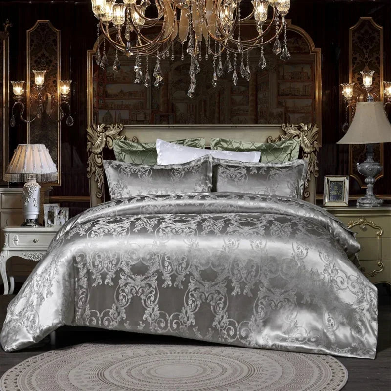A luxurious silver damask duvet cover set displayed on a bed with ornate gold framing and dark wood paneling.