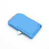 A light blue magnetic seam guide with a stitch gauge for sewing.