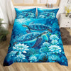 A vibrant blue sea turtle patterned duvet cover set featuring various marine life and underwater scenes.