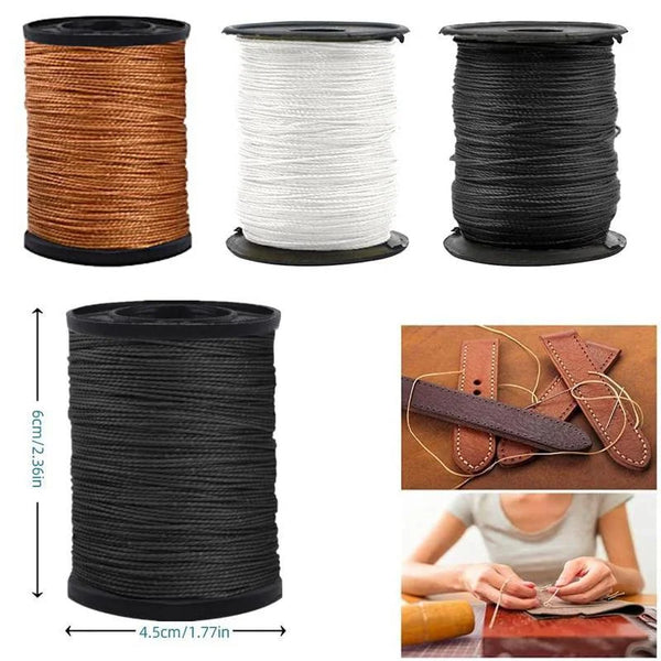 A set of heavy duty nylon upholstery thread spools in brown, white, and black.