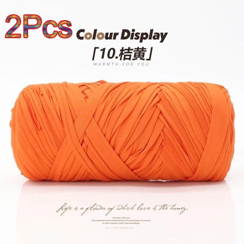 Two orange reusable elastic yarn balls displayed for crafting