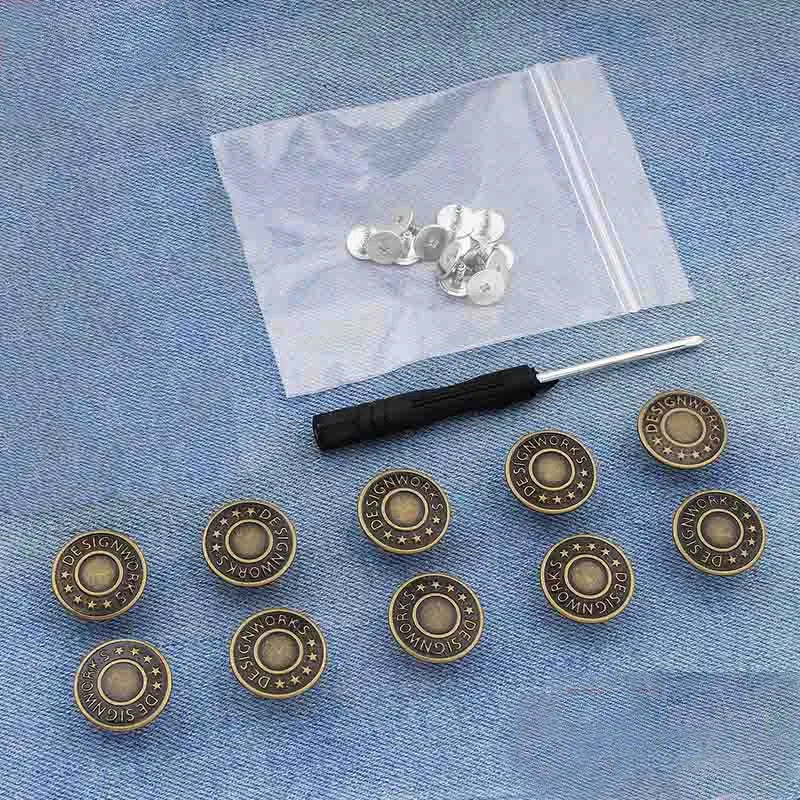 Silver metal button pins are displayed on a translucent bag with a blue denim background.