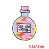 Pink letter embroidered iron-on patch shaped like a bottle labeled Self-Love Potion