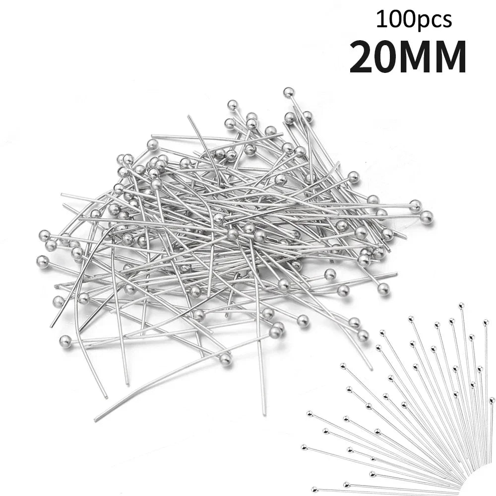 A pile of 100 stainless steel ball head pins with a 20mm length.
