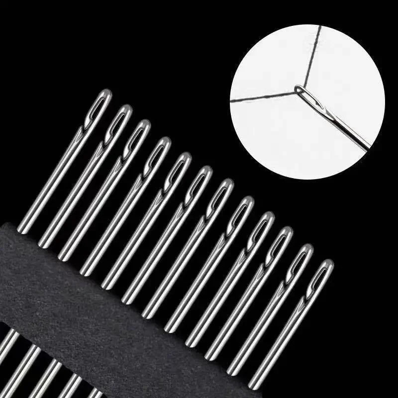 A close-up view of a stainless steel sewing kit with various size needles against a black background.