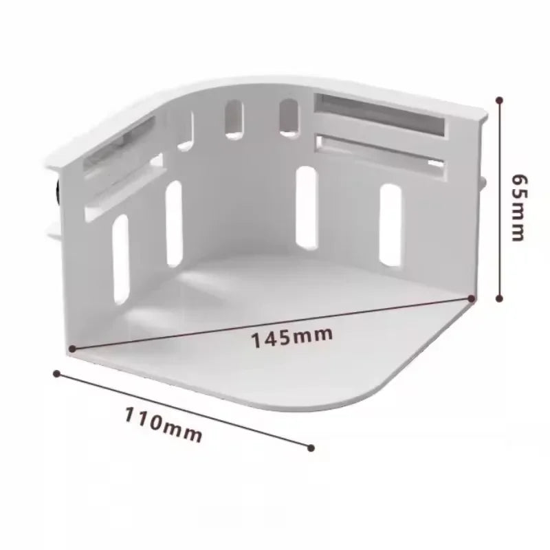 A white plastic organizer tray with multiple slots and a slanted base, shown from above.