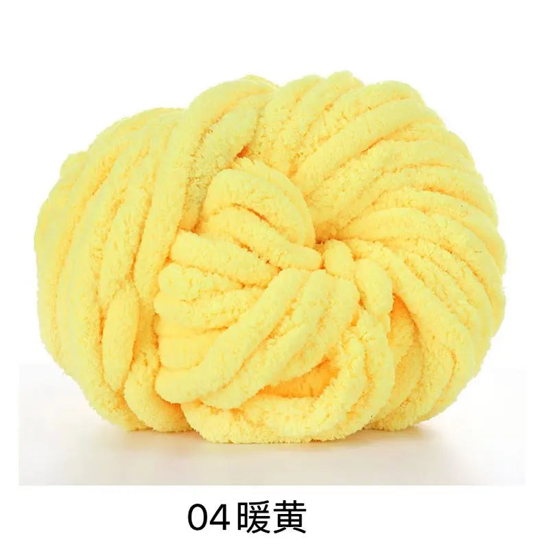 A ball of bright yellow chunky acrylic yarn for knitting and crochet projects.