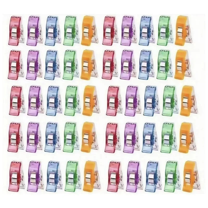 A set of colorful multipurpose sewing and craft clips in various colors like pink, purple, green, and orange.