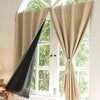 Self-adhesive black blackout curtains in beige fabric hanging on a white window frame.