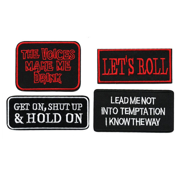 Four black and red embroidered letter patches with various phrases like Let's Roll and Get On Shut Up & Hold On
