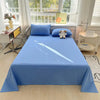 A light blue organic cotton bedding set displayed on a bed with white furniture and natural light.