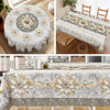 Elegant floral tablecloth featuring white and gold flowers on a light gray background with embossed edges.