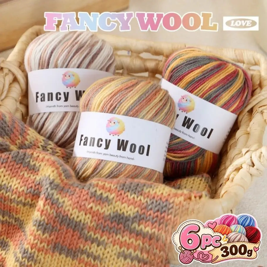 A set of six balls of gradient alpaca wool yarn in various colors and textures displayed in a woven basket.