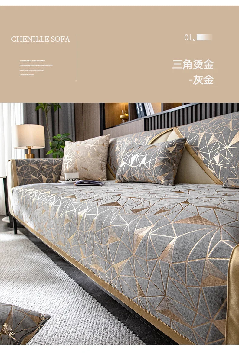A close-up of a luxury Chenille sofa cover featuring geometric patterns in gray and gold tones.