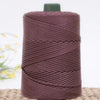 A spool of dark mauve crochet ice rope used for DIY crafts.