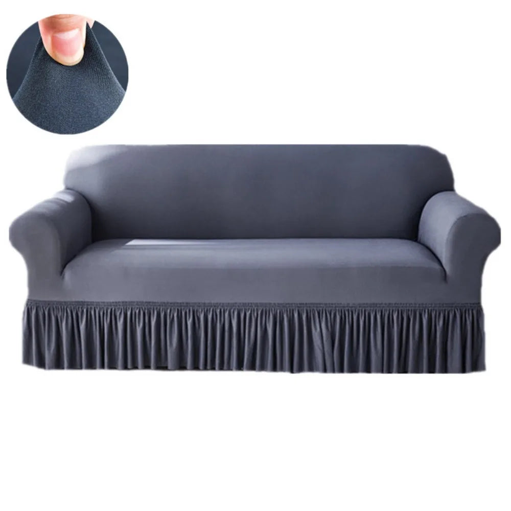 A gray dustproof stretch sofa slipcover with a gathered ruffle detail and a close-up of the fabric texture.