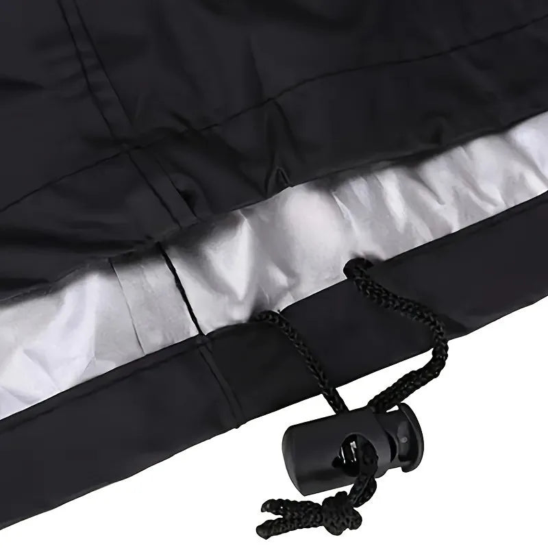 Black heavy duty round grill cover with silver lining and black drawstring