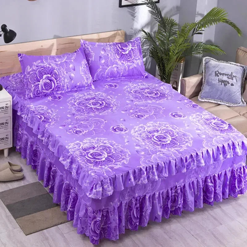 Purple fitted bed sheets with floral pattern and elastic lace trim displayed on a bed.