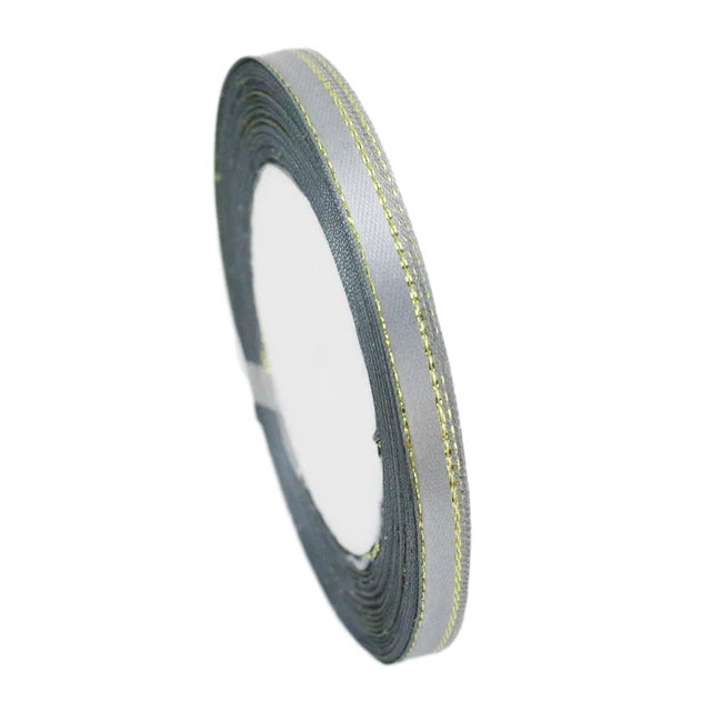 Roll of 6mm gold-edged satin ribbon in gray for gift wrapping and crafts