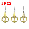 Three pairs of gold-handled stainless steel crafting scissors with sharp blades