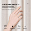 A hand is touching a linen-like material fabric, highlighting its luxurious feel and features like being machine washable and