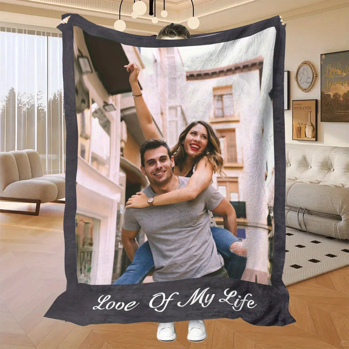 A personalized photo frame blanket featuring a couple smiling in an outdoor setting.