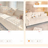 A light cream plush velvet sofa cover with white decorative pillows and a gray non-slip backing.