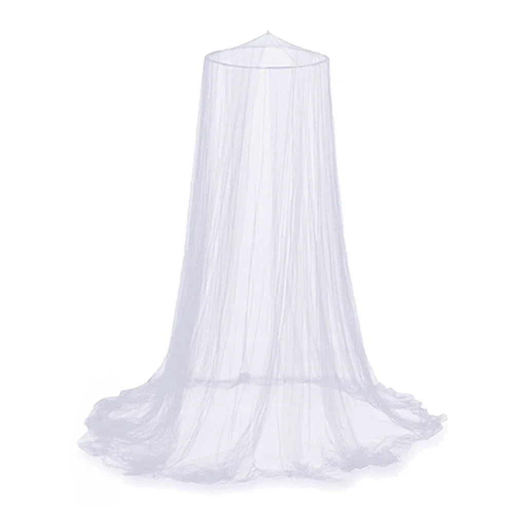 A sheer, large dome mosquito net spread out on a white surface.