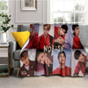 A fleece throw blanket featuring a collage of Stray Kids Kpop members in various poses and outfits.
