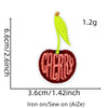 A yellow cherry fruit patch embroidered on a white background, measuring 1.2g.