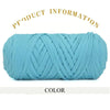 A skein of thick, light blue polyester blended yarn is shown coiled and textured.