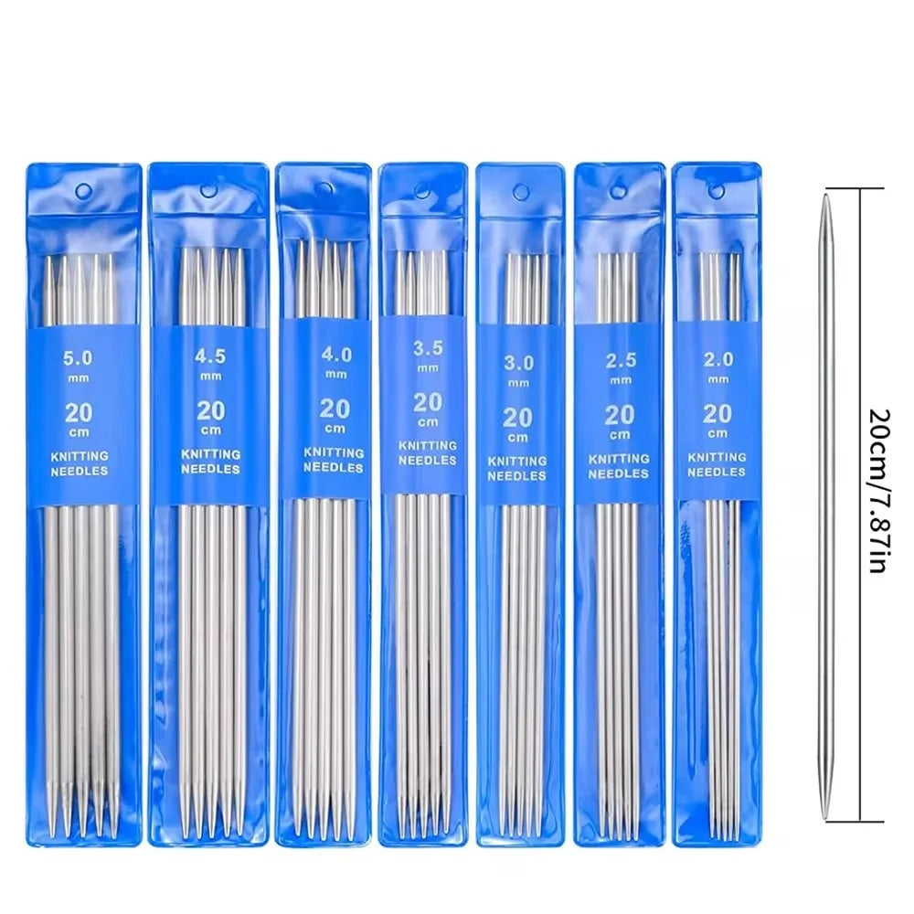 A set of stainless steel double-pointed knitting needles in various sizes, packaged in clear plastic.