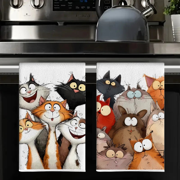 A set of two colorful cartoon kitchen towels featuring various cat characters.