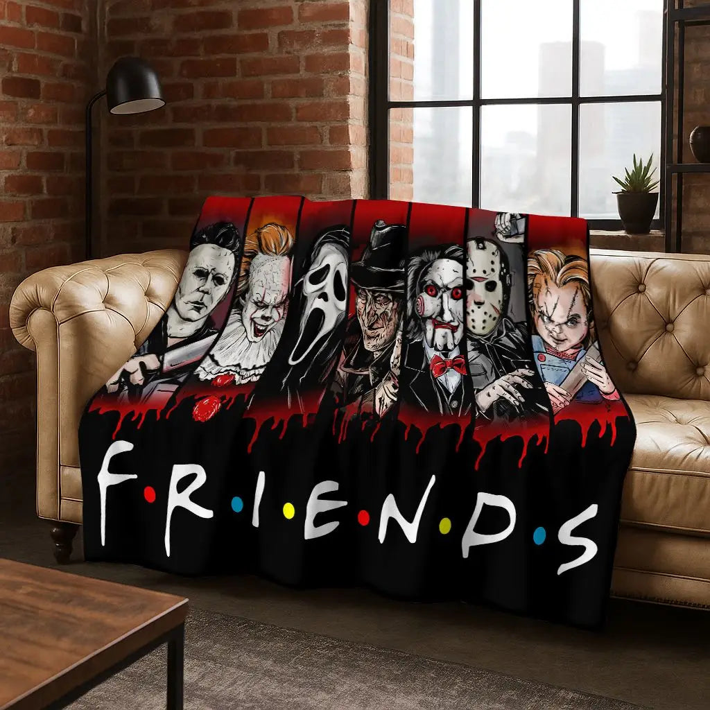 A black and red horror character flannel throw blanket displayed on a sofa.