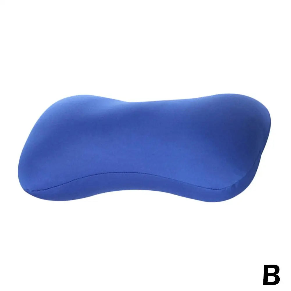 A blue microbead neck pillow shown from the side.