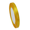A roll of 6mm gold-edged satin ribbon for gift wrapping and crafts.