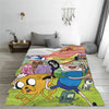 A colorful cartoon blanket featuring various animal characters and adventure themes.